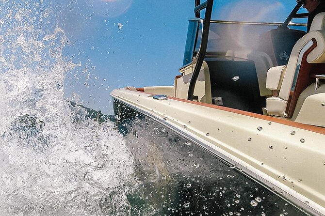 2H Private Cruise on Lake Como Tender yacht Invictus 9 pax - Punta Lace... and the price-tag church: Villa Le Fontanelle