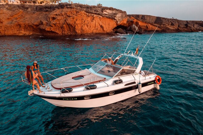 3 Hour Shared Motor Yacht Boat Trip & Snorkeling With Small Group - Setting out from Puerto Colón toward Costa Adeje’s best angles