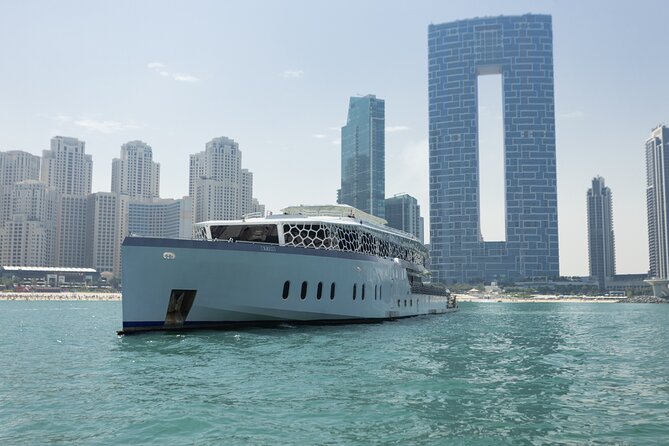 Dubai: Lotus Mega Yacht 3-Hours Dinner Cruise Tour - Booking Timing, Size, and What That Means On Board