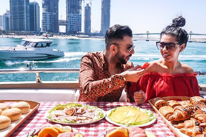 Dubai Marina Yacht Tour with Optional Breakfast or BBQ - Skydiving overhead: a weird-but-fun bonus