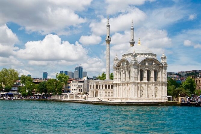 Exclusive Luxury Yacht Bosphorus Sightseeing Cruise in Istanbul - Dolmabahçe Palace Gardens Along the Bosphorus Shore