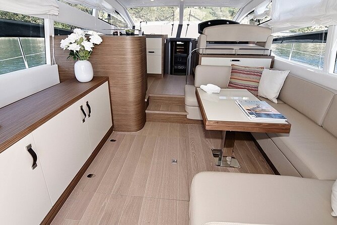 Fjordcruise - Luxury Yacht Arctic Queen - Arctic Queen comfort: warm saloon, flybridge views, and real options for staying outside