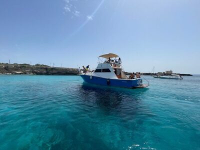 From Trapani: Favignana and Levanzo Yacht Tour with Stops - Favignana From the Sea: Village Views and Real Coves