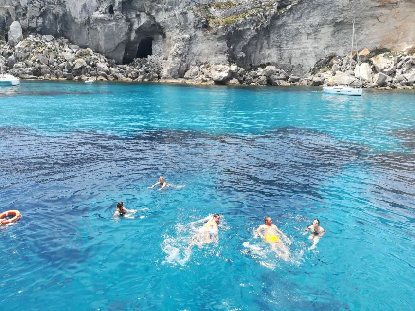 From Trapani: Favignana and Levanzo Yacht Tour with Stops - Rice Salad Lunch on Board: Included Fuel That Fits the Day