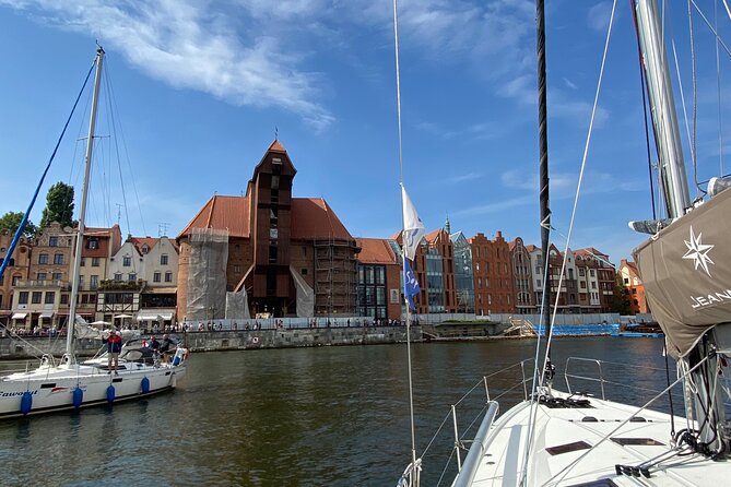 Gdansk Motlawa and Port Yacht Cruise with Welcome Drink - The industrial port tour: cranes, quays, and ships actually at work