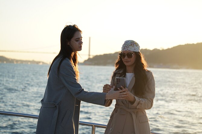Guided Bosphorus Afternoon Cruise on Yacht - Ortaköy: cafes, souvenir lanes, and the Bosphorus Bridge in the same frame