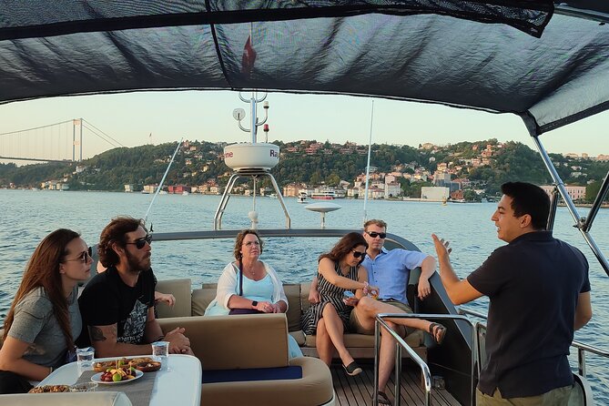 Istanbul Sunset Cruise on Luxury Yacht - Guided Group Cruise - Galata Bridge and Galata Tower views from the water, plus modern Galataport