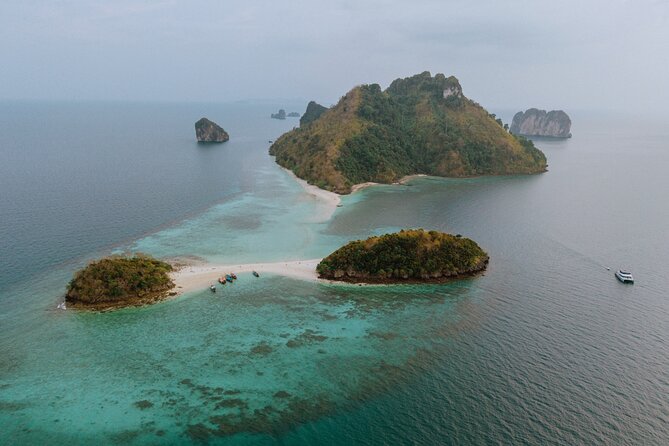 Krabi: 4 Island Luxury Yacht with Snorkelling & Clear Kayaking - Low tide magic: where the sea parts and a sandbar shows up
