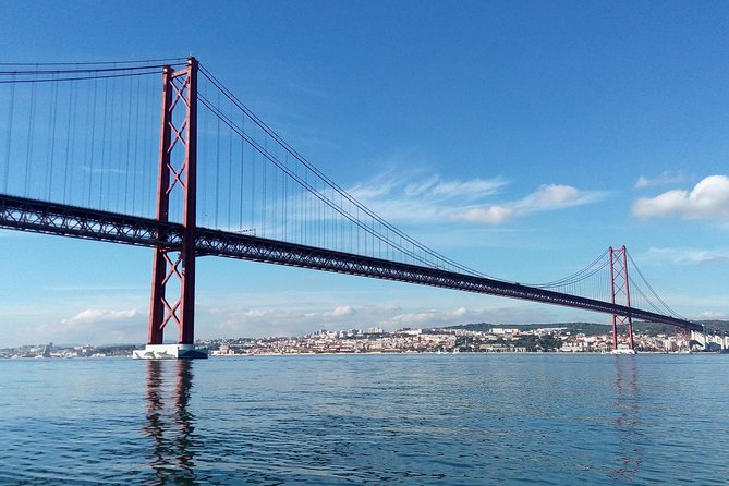 Lisbon Sailing Tour on a Luxury Sailing Yacht with 2 Drinks - St. Jorge Castle, the Cathedral, and Alfama from the Water