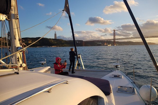 Lisbon: Sunset Cruise With Drinks on Spacious Yacht - Where You Board: Santo Amaro Dock by the 25 de Abril Bridge