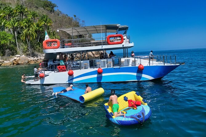Mega Catamarans ALL INCLUSIVE Remote Paradise Beach Adventure - Return cruise to Puerto Vallarta: music, sea life, and a buzzy finish