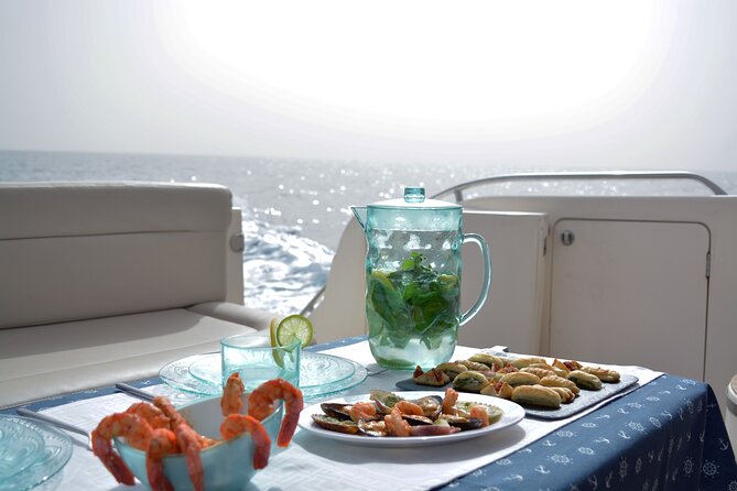 Private Boat Tour on Royal Ocean Yacht, Tenerife - Stop 2 in Los Cristianos: snorkeling, swimming, and a lunch that doesn’t skimp