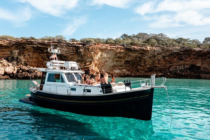 Private Full Day boat charter in Traditional Balearic Yacht - Water Time: snorkeling spots, paddleboarding, and inflatable rings