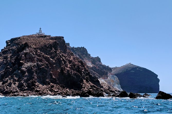 Private Full-Day Motor Yacht Cruise with Meal, Open Bar+Transfers - Red Beach and White Beach: the Caldera swims you’ll remember