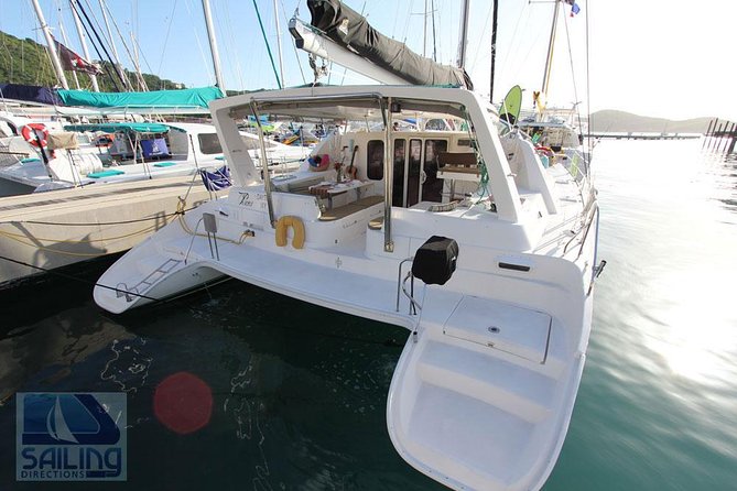 Private Luxury Catamaran Yacht. Full or Half Day Charter - Sail, Beach, Snorkel. - In the water: snorkeling gear, floats, and the calm “hang and watch” style