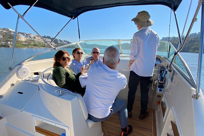 Private tasting in the Douro (1 to 7 people) on a yacht for yourself - Sailing under Porto’s big bridges: how the route gives you shape and scale