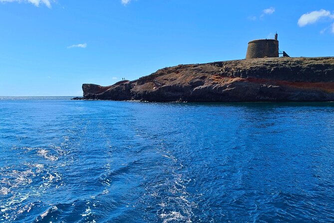 Private yacht in Papagayo Beaches with Gourmet or Premium menu - Playa Mujeres and the Los Ajaches setting: wide beach, sea-side perspective