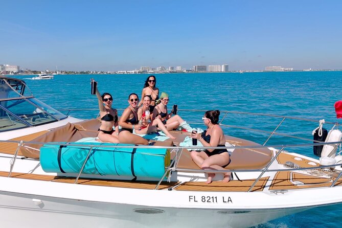 Private Yacht Rental Cancun Up to 15 passengers Isla Mujeres - Onboard Comfort: Bathrooms, Bow Sunbeds, Bluetooth Sound, and Real Crew Support