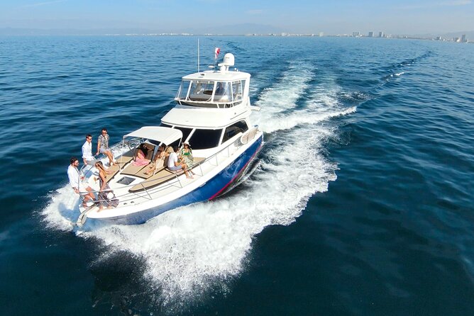 Puerto Vallarta: Private Swim & Snorkel Yacht Tour w/Open Bar - Cruising the Malecon: City Views Without the Crowds