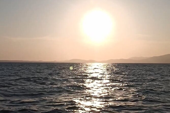 Sail boat day charter tour mallorca yacht llaut tradicional boat - The sail stops in Palma Bay: clear water and quick history pauses