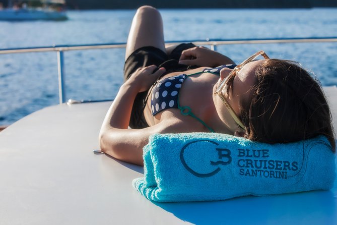 Santorini: Motor Yacht Day Cruise with 5-Course Lunch - Stop 1: Santorini Volcano Swim Time and Included Admission