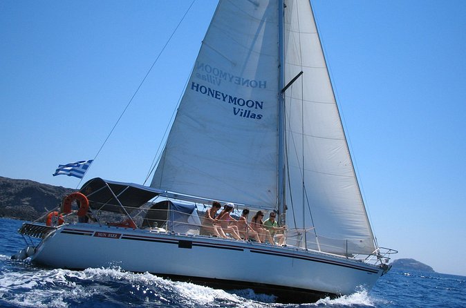 Santorini Oia: Private Sailing Yacht Cruise with Meal and Drinks - Volcano of Santorini: seeing the caldera from the sea (and the sulfur-rich waters)