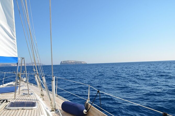 Santorini: Private Sailing Yacht Cruise with Meal and Drinks - The Food and Drinks Plan: Unlimited Wine, Greek Lunch, and Dinner at Sea