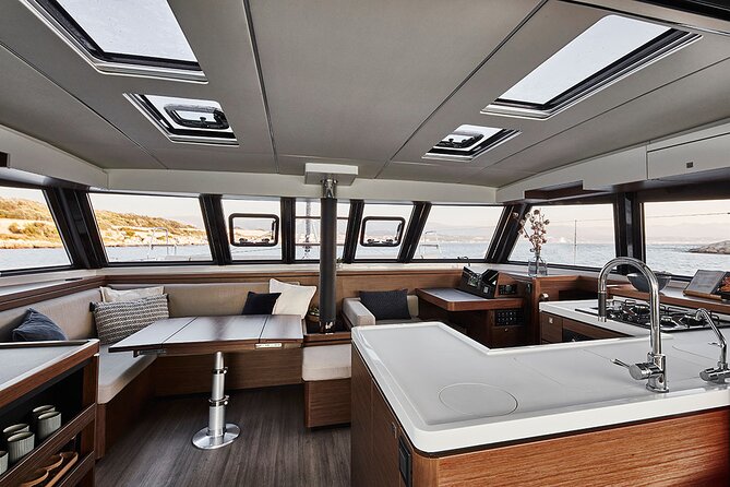 Santorini Private Tour Half-Day Sailing Platinum Catamaran Cruise - Aspronisi and Palea Kameni: Uninhabited Islets and Volcanic Activity