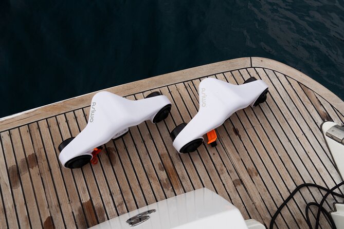 Shared Luxury Yacht Cruise with Champagne and Tapas - Playa del Duque swim time: snorkel gear, paddle boards, and sea scooters
