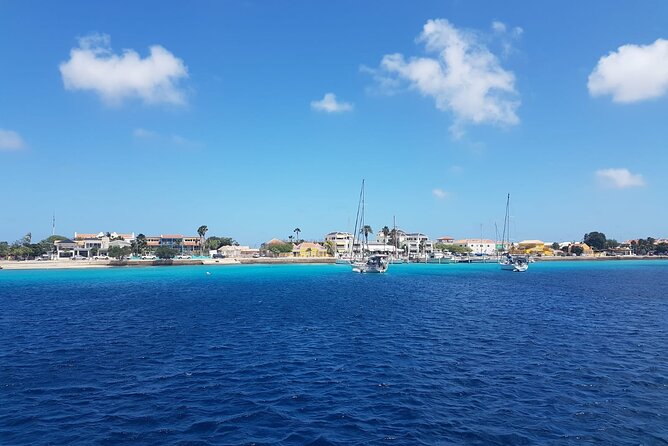 Yacht tour with local guide & snorkeling activities - Board comfort: shade, seating, and a real bathroom