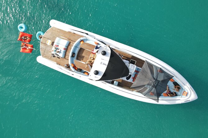 Yacht YES DARLING - Private Boat St Martin, St Barth & Anguilla - Entering YES DARLING: open-deck luxury with a Porsche 917 wink